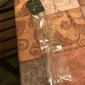 scissor necklace with rhinestone studded earrings